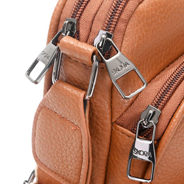 Elegancia y Funcionalidad: Bandolera Nador Sienna.
